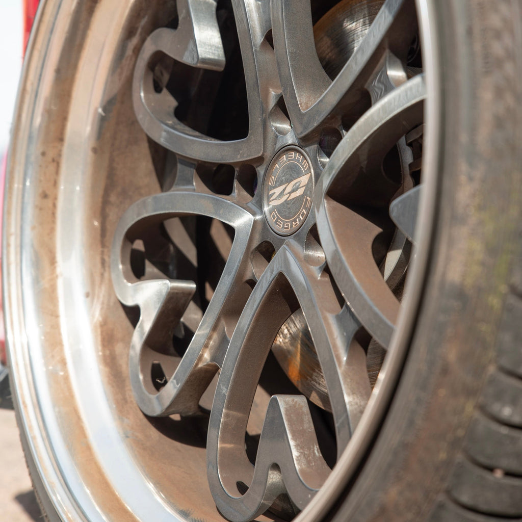 Close-up of a dirty wheel before E1 application