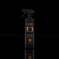 Black spray bottle labeled 'ELEVEN E3' on a black background