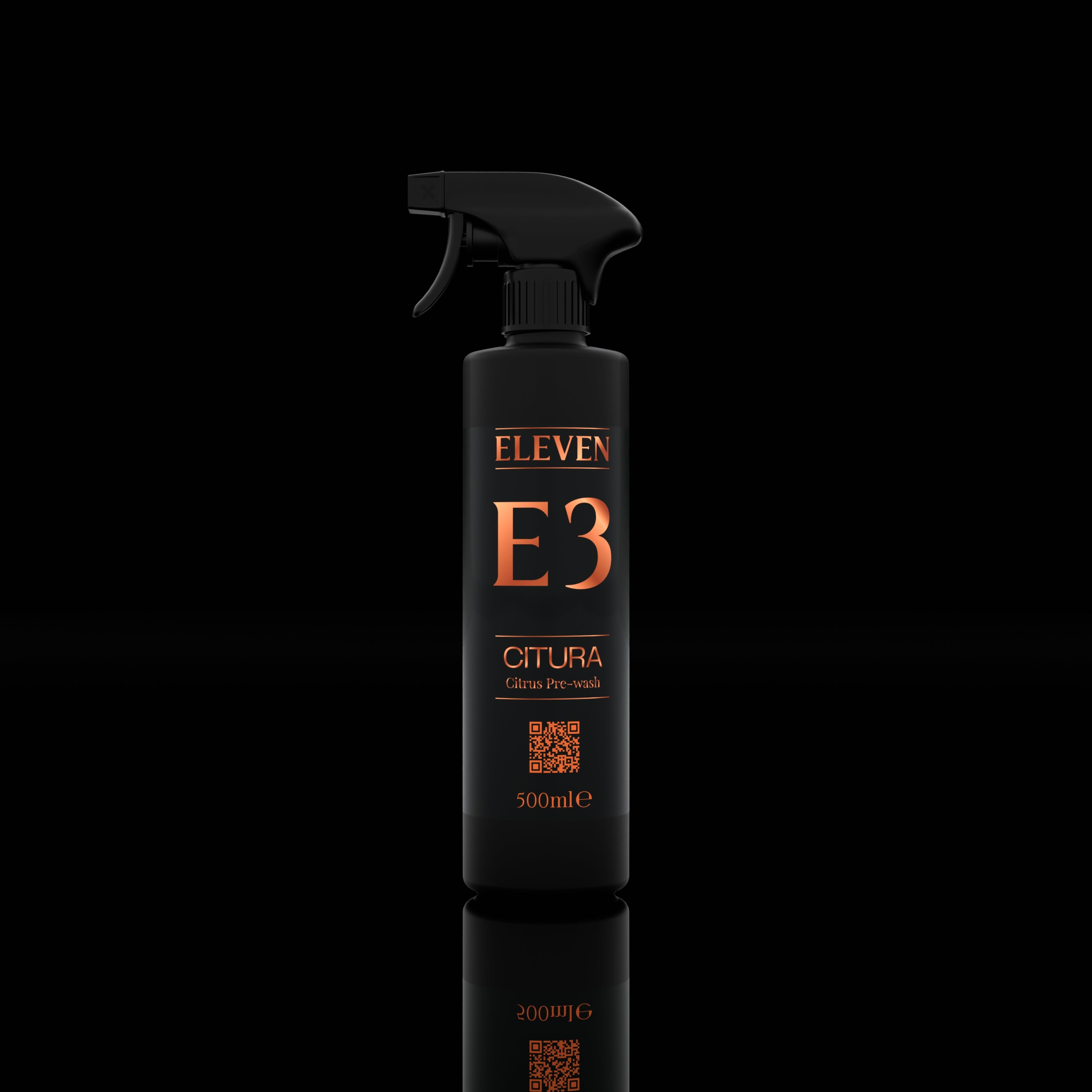 Black spray bottle labeled 'ELEVEN E3' on a black background